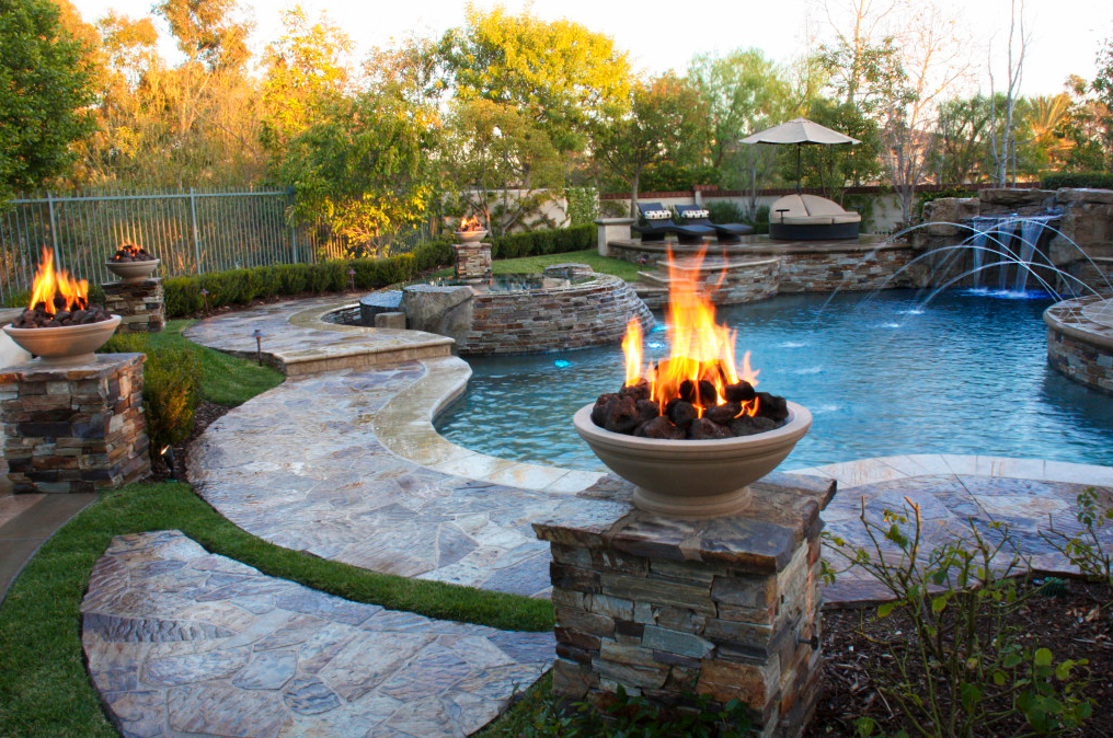 Pool and spa with travertine coping and fire features. Tustin, Orange County, Ca.