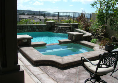 Raised Spa With Stone Poured In Place Coping
