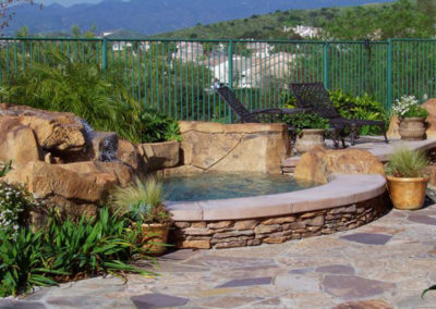 Raised Spa With Rock Waterfall