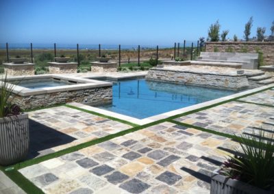 Pool & Spa With Raised Stone Decking